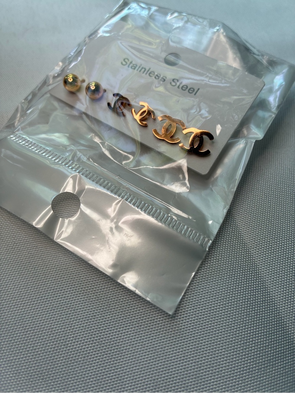 Gold Tone Stainless Steel Logo Stud Earring Set - Picture 4 of 4